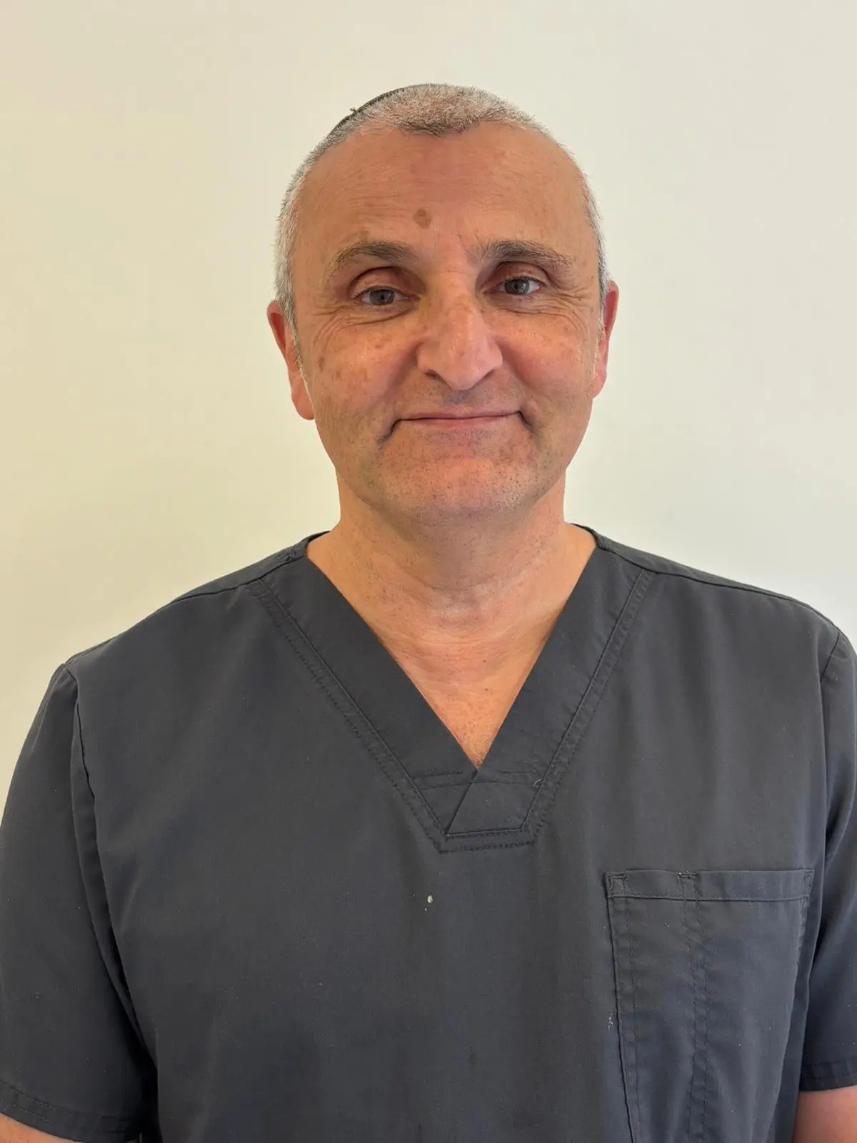 Photo of Dr. Uzia Pinto, Clinic Director & Senior Dentist